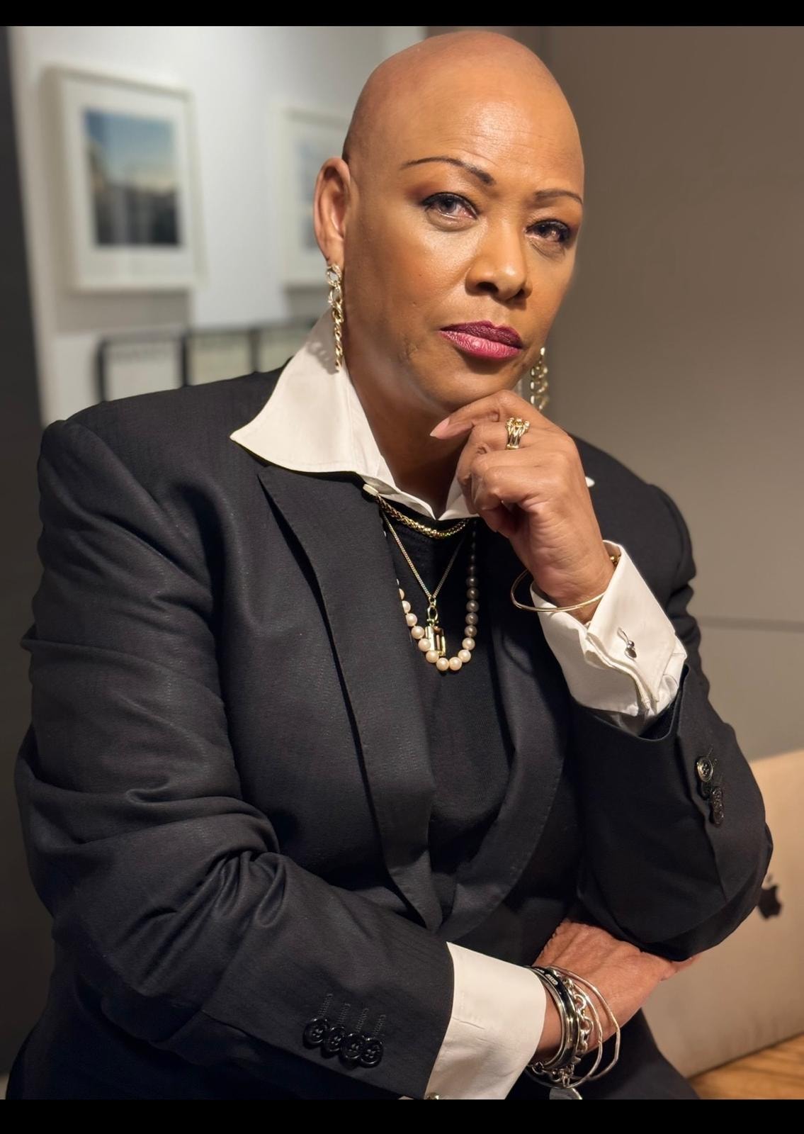 Sharon-Ann Phillips professional portrait in a black suit
